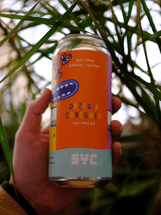 dazed and consumed image with hand holding can